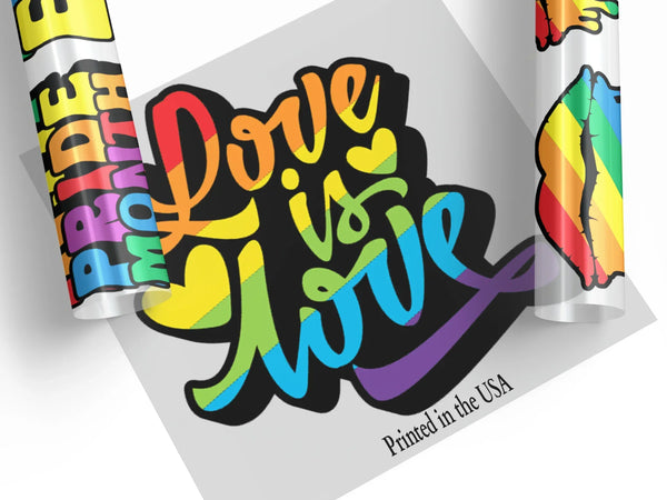 Pride Month LGBTQ rainbow DTF transfers featuring "Dare to be Pride" text with vibrant rainbow gradient colors and rainbow flag designs, printed in the USA