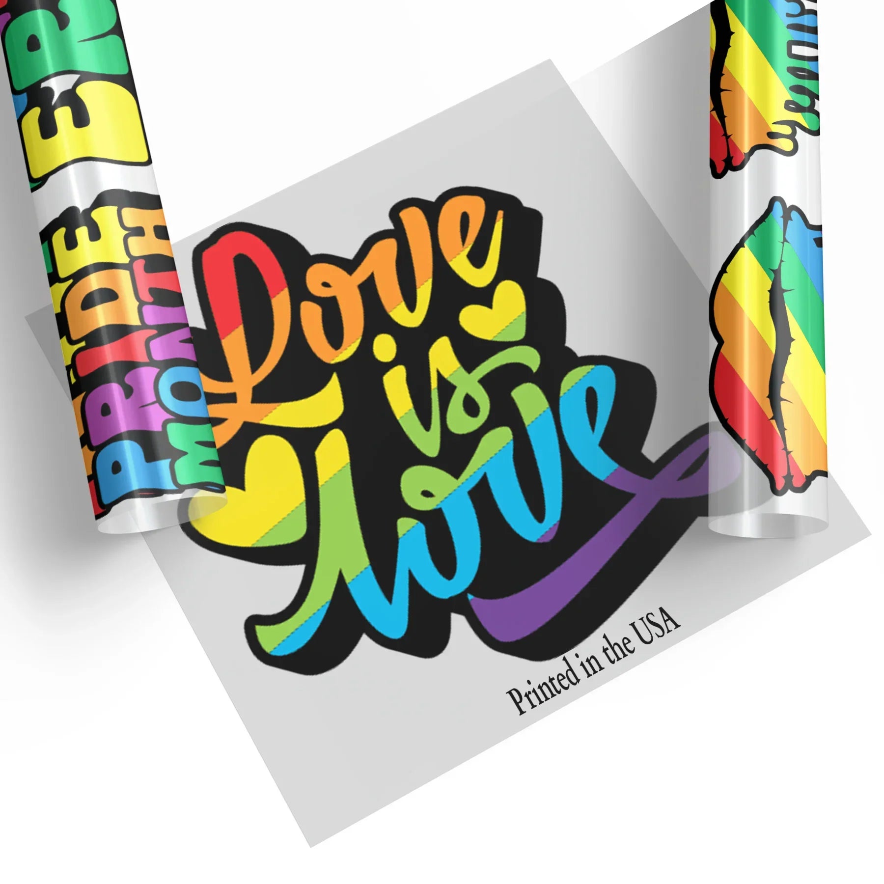 Pride Month LGBTQ rainbow DTF transfers featuring "Dare to be Pride" text with vibrant rainbow gradient colors and rainbow flag designs, printed in the USA