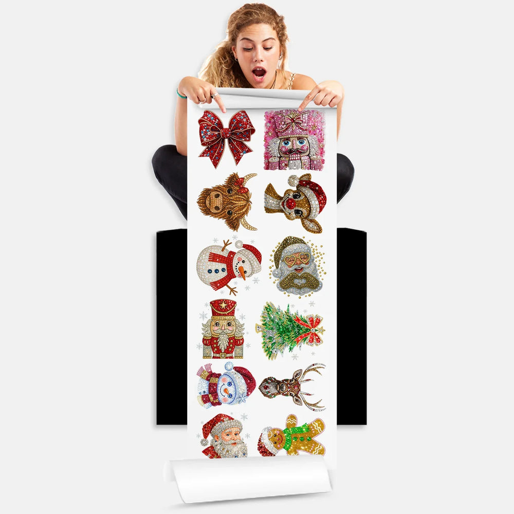 Person holding Christmas DTF gang sheet with 12 rhinestone-style Santa, nutcracker and holiday designs