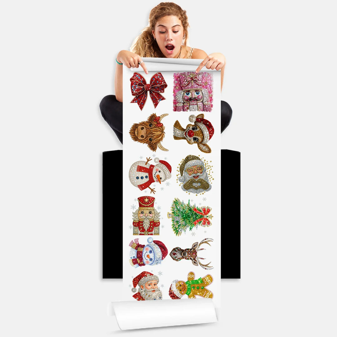 Person holding Christmas DTF gang sheet with 12 rhinestone-style Santa, nutcracker and holiday designs