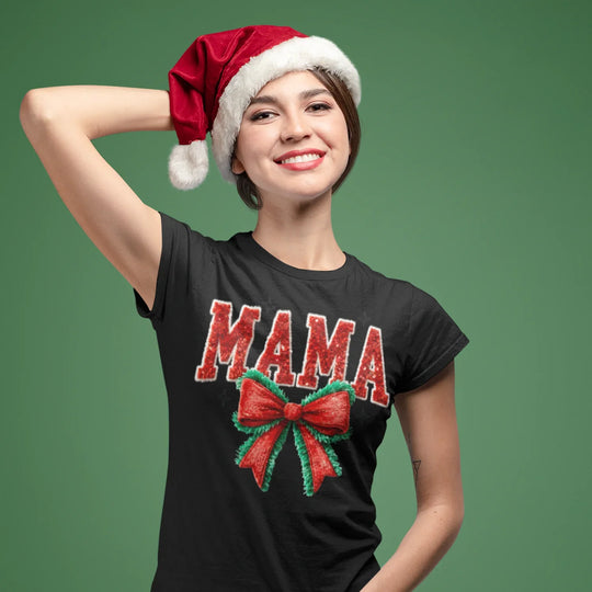 Woman wearing Christmas MAMA DTF transfer on red holiday shirt with festive bow design