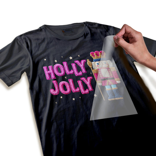 Peeling transfer of Holly Jolly nutcracker DTF transfer showing high-quality print resolution and vibrant colors