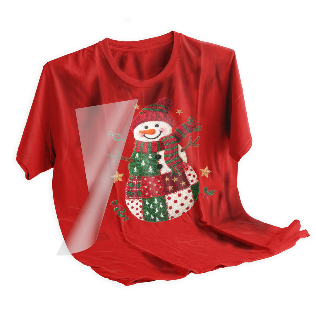 Step-by-step application of knitted snowman Christmas DTF transfer using heat press on holiday apparel merchandise
