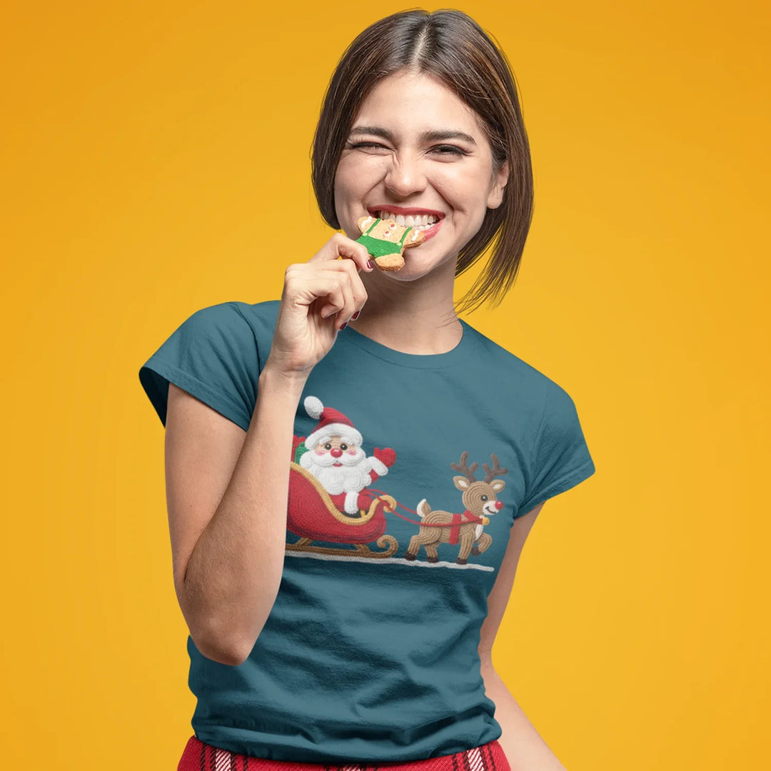 Christmas DTF transfer applied to red holiday shirt showing Santa reindeer sleigh design with professional results