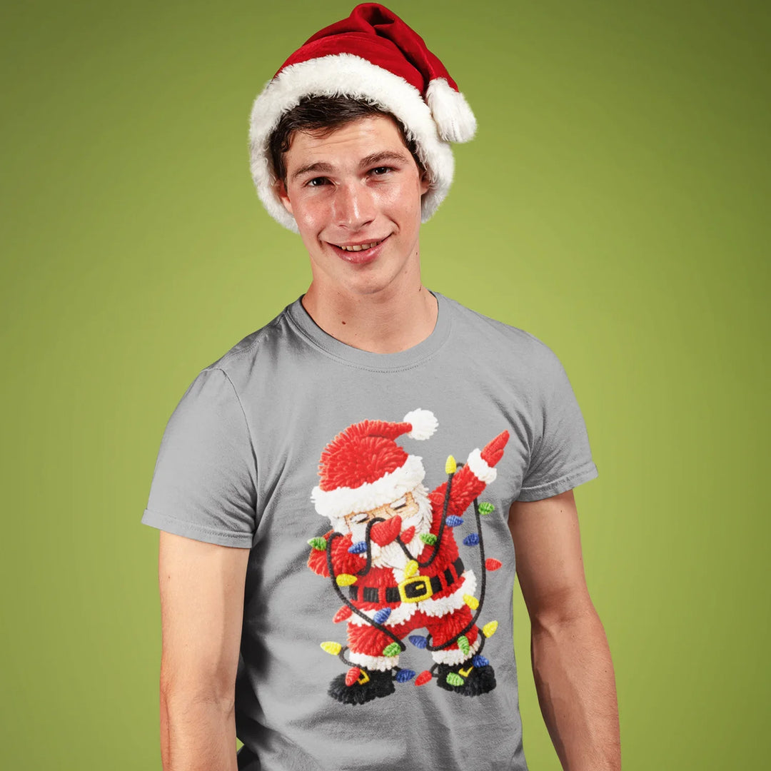 Person wearing t-shirt with applied Santa Christmas lights DTF transfer showing vibrant holiday design results