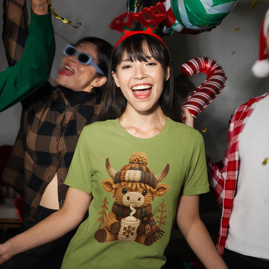 Model wearing t-shirt with Christmas highland bull DTF transfer design showing winter holiday apparel styling