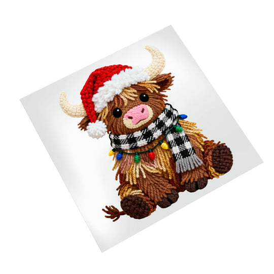 Festive highland cow Christmas DTF transfer featuring red Santa hat, winter scarf and holiday lights decoration