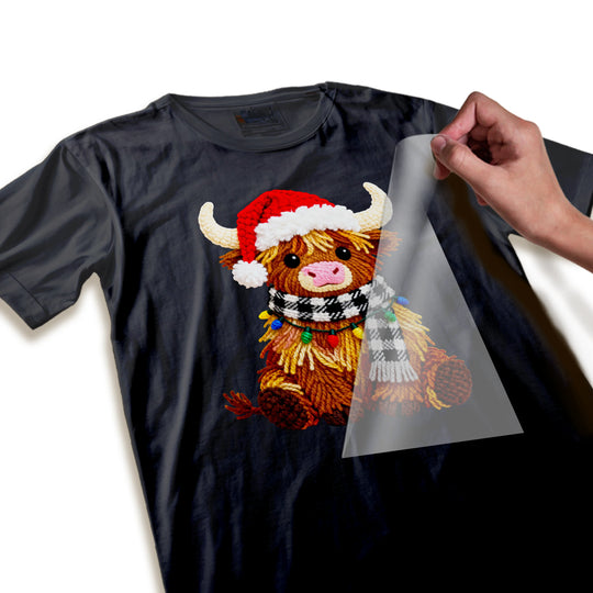 Close-up detail of highland cow Christmas DTF transfer showing textured fur and embroidered-style quality
