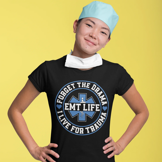 Healthcare professional wearing EMT Live for Trauma DTF transfer design on navy blue shirt showing medical pride