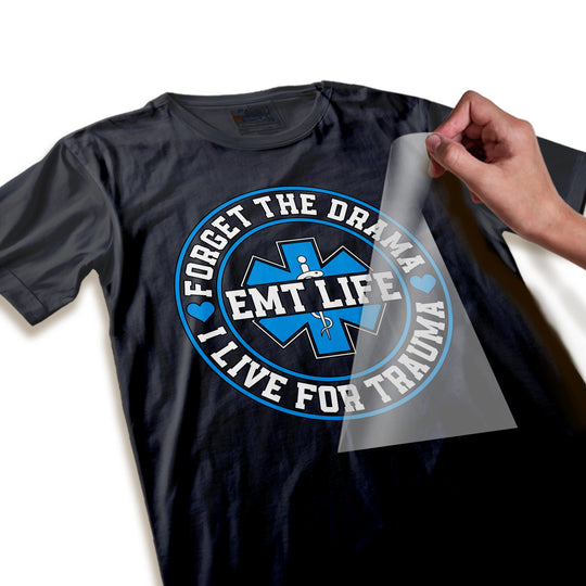 Close-up detail view of EMT DTF transfer showing crisp text quality and vibrant blue coloring of the medical star of life symbol and badge elements