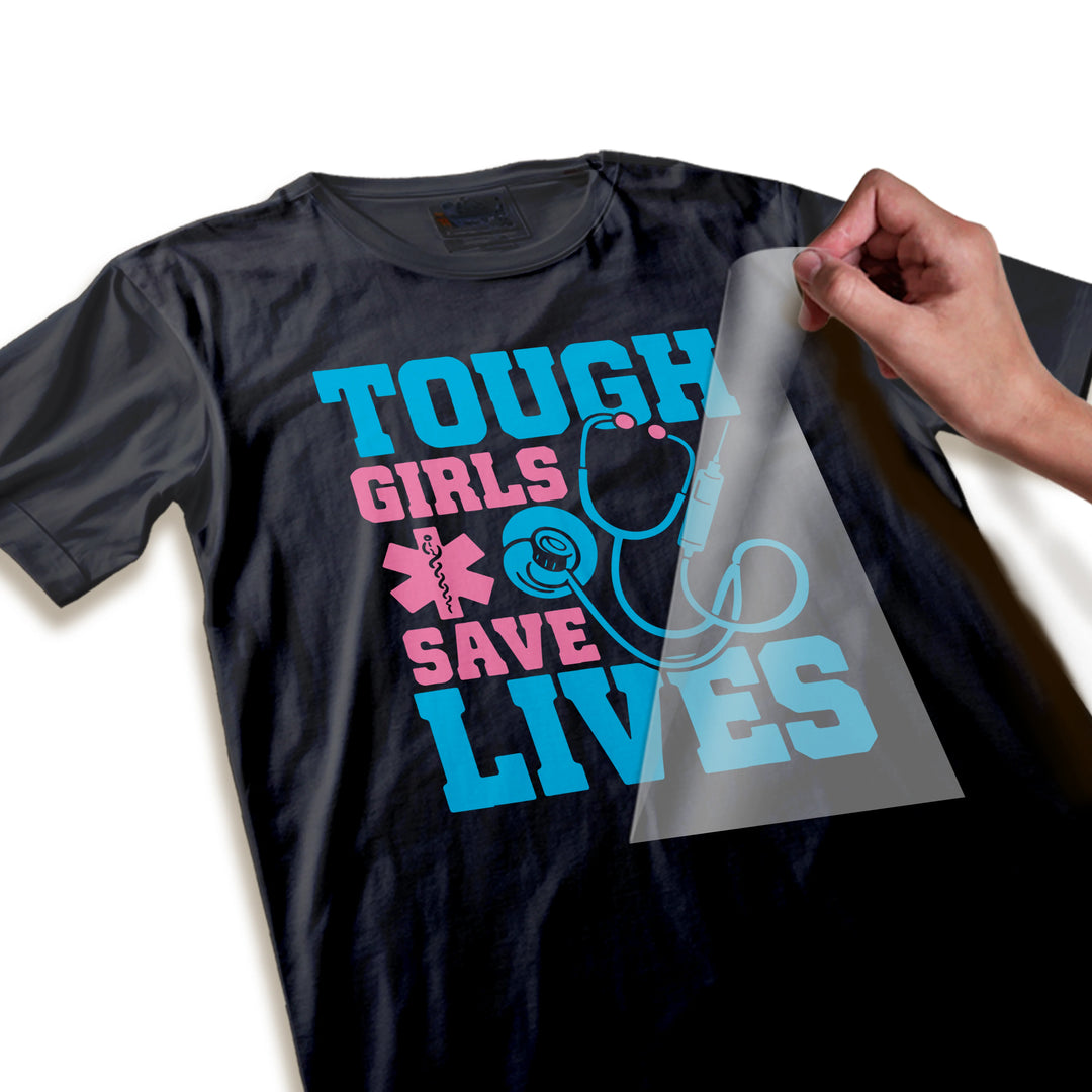 Close-up detail of medical DTF transfer showing textured blue lettering and pink stethoscope graphics