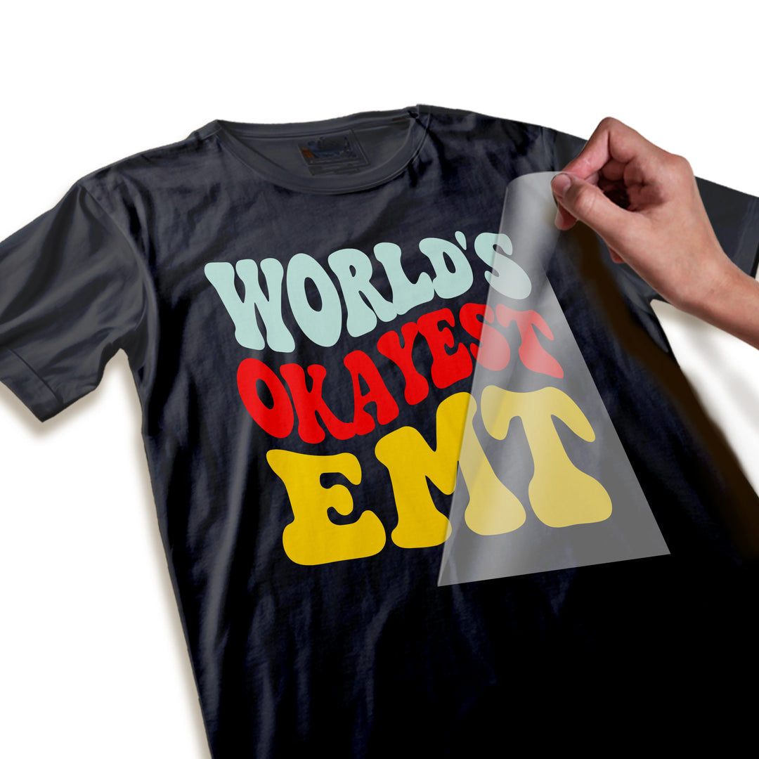 Close-up detail view of the groovy wavy text quality and color vibrancy in the World's Okayest EMT DTF transfer design