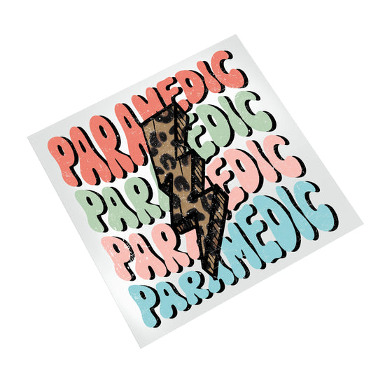 Paramedic groovy wavy text DTF transfer on white background showing vibrant coral, green and blue curved bubble letters