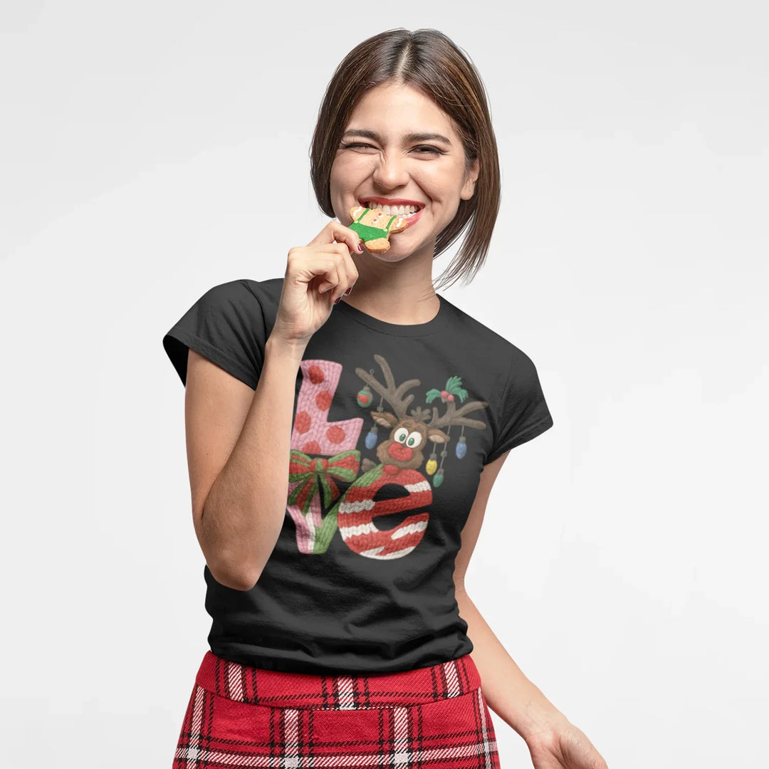 Model wearing Christmas shirt with reindeer love DTF transfer design showcasing holiday apparel application