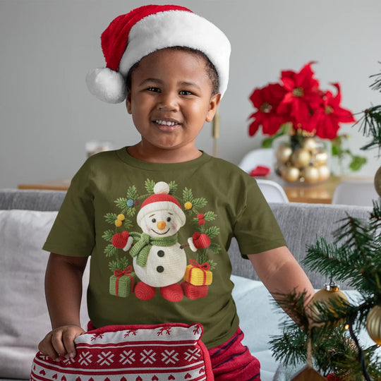 Holiday apparel showing crochet snowman DTF transfer applied to festive Christmas t-shirt on model wearing winter outfit