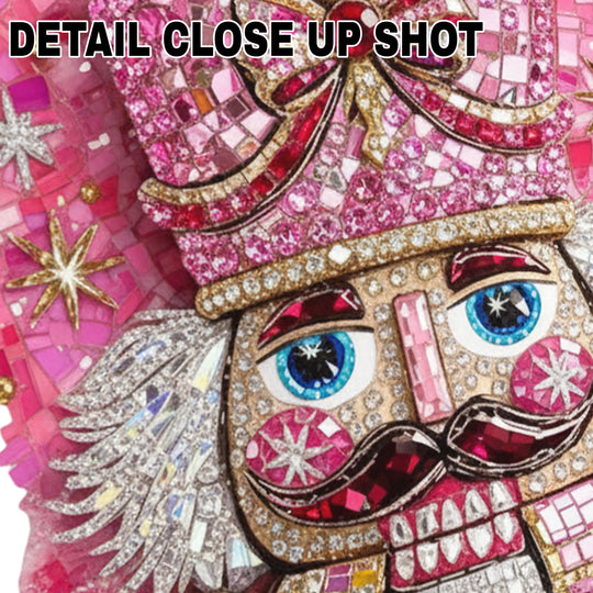 Pink rhinestone nutcracker Christmas DTF transfer with sequin embellishments and mosaic background on transparent sheet