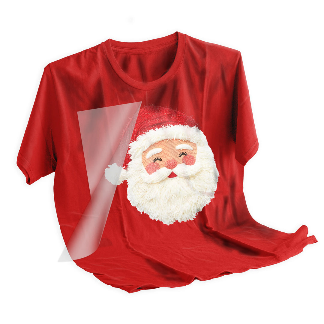 Applied Santa face DTF transfer on dark colored t-shirt showing the vibrant Christmas design after heat press application