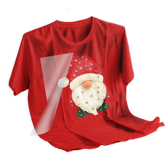 Christmas gnome Santa DTF transfer heat pressed onto festive holiday t-shirt demonstrating final application results and vibrant color quality