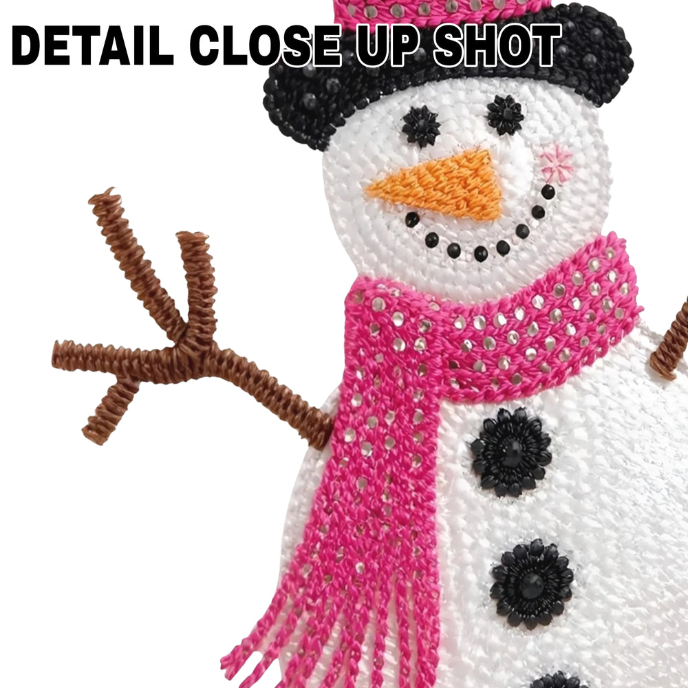 Christmas snowman DTF transfer design with black top hat, pink scarf and brown stick arms on white background