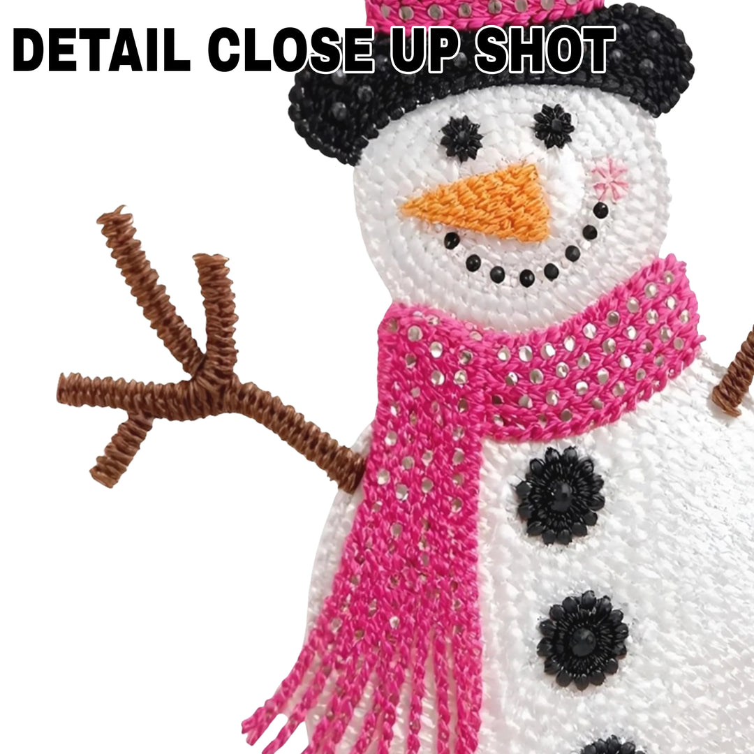 Christmas snowman DTF transfer design with black top hat, pink scarf and brown stick arms on white background