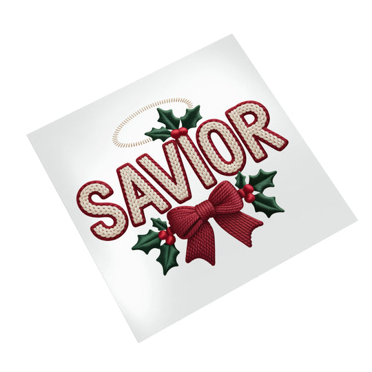 Christmas SAVIOR DTF transfer on white background displaying knitted text effect with holly leaf decorations and golden halo accent