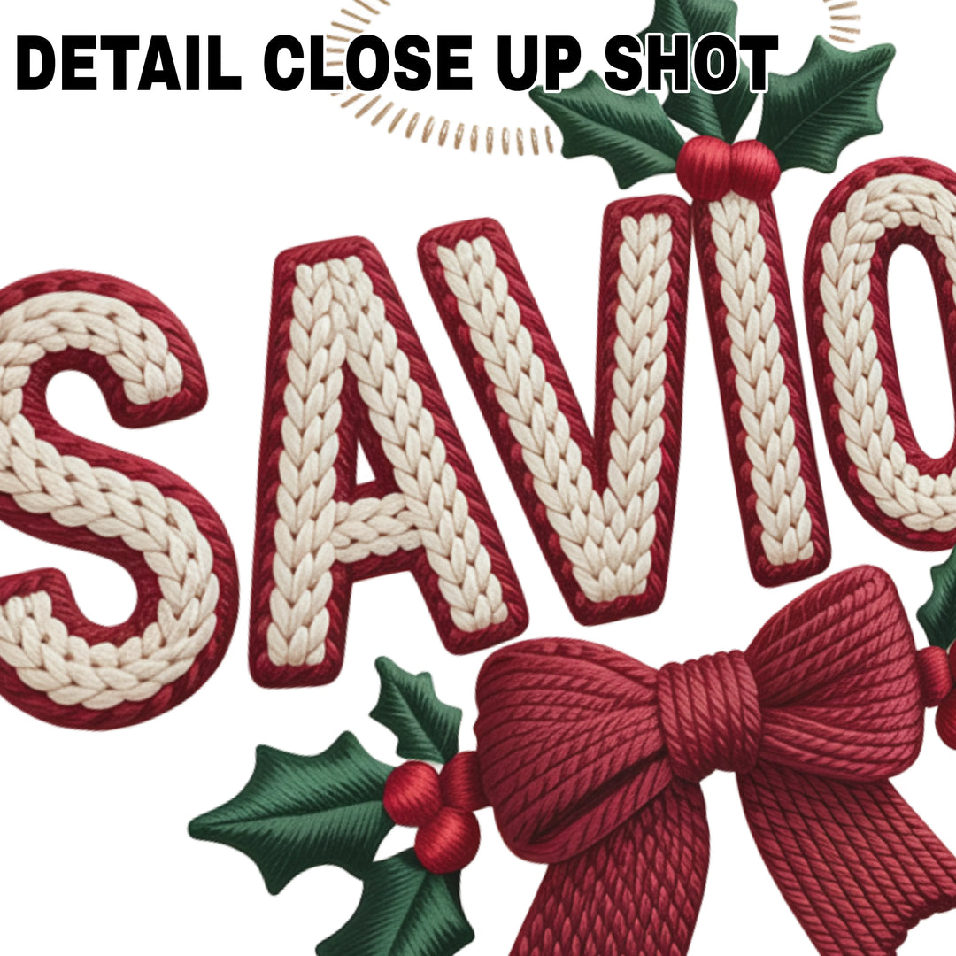 Christmas DTF transfer design showing SAVIOR text in cream knit texture with burgundy trim, decorated with green holly leaves, red berries and burgundy bow