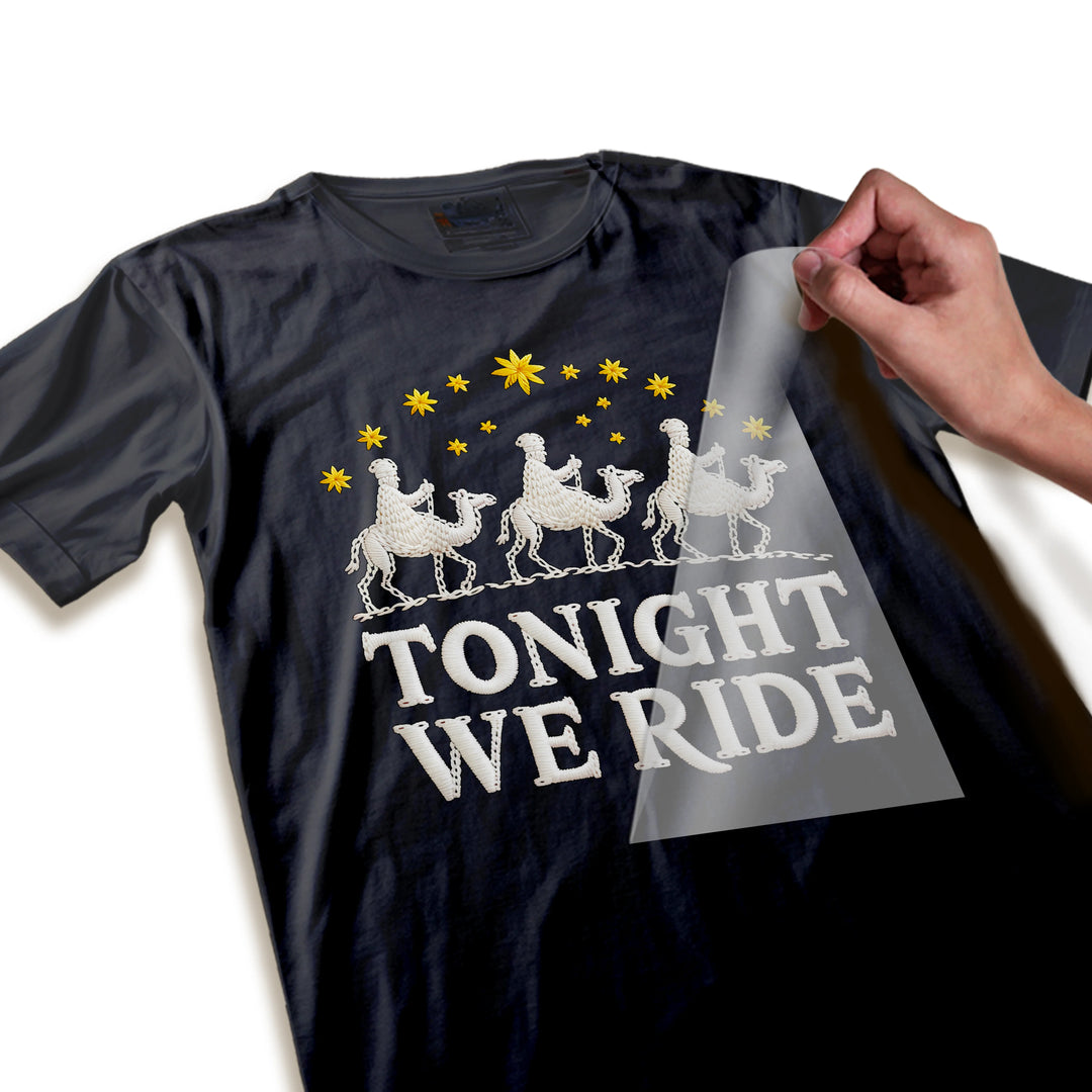 Close-up detail shot of three wise men DTF transfer showing yarn-like texture quality and embroidered lettering finish