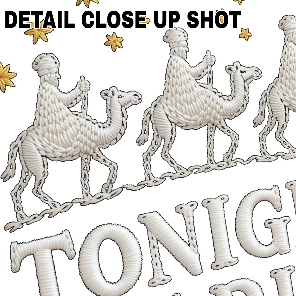 Christmas DTF transfer design showing three wise men riding camels with gold stars and Tonight We Ride text in yarn textured style