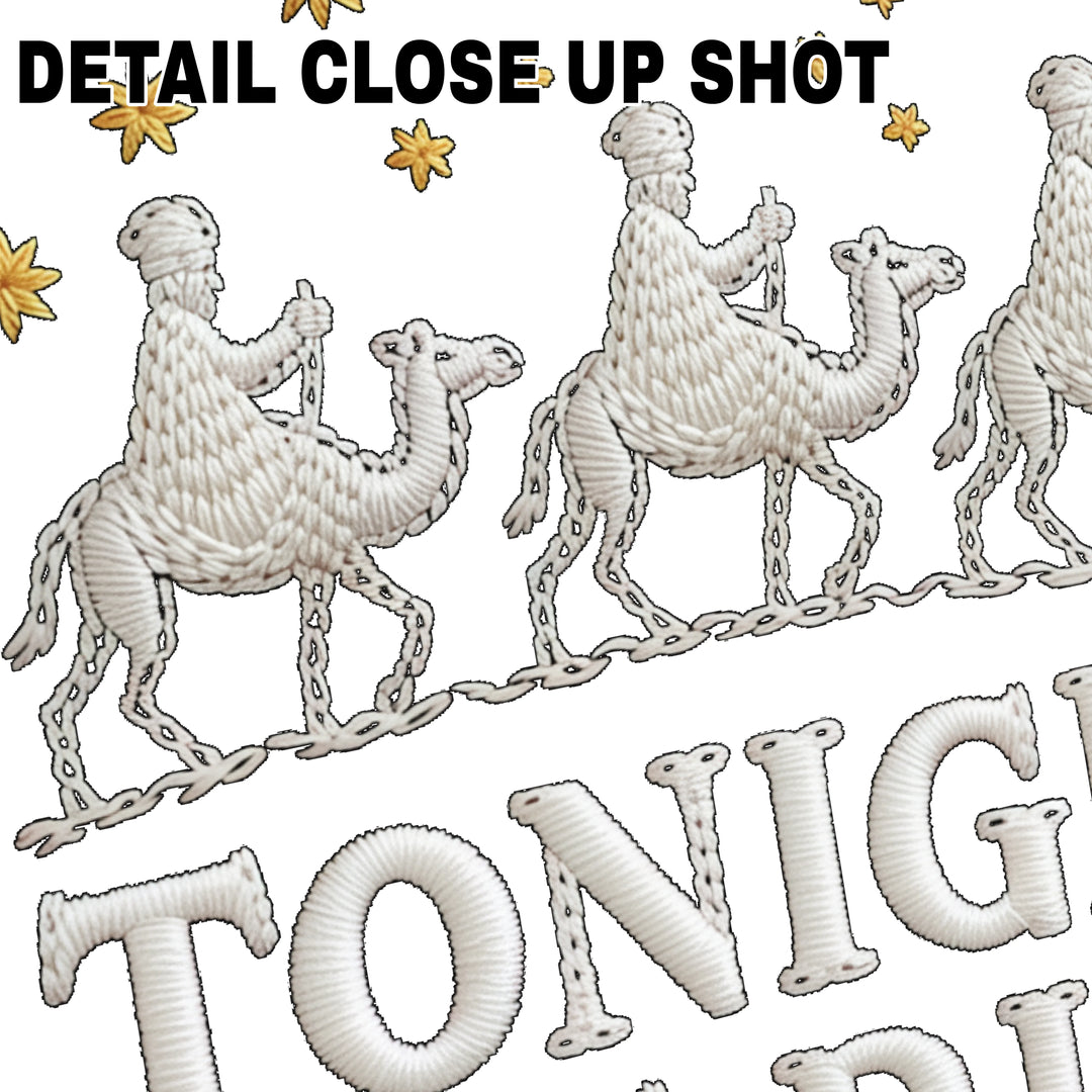 Christmas DTF transfer design showing three wise men riding camels with gold stars and Tonight We Ride text in yarn textured style
