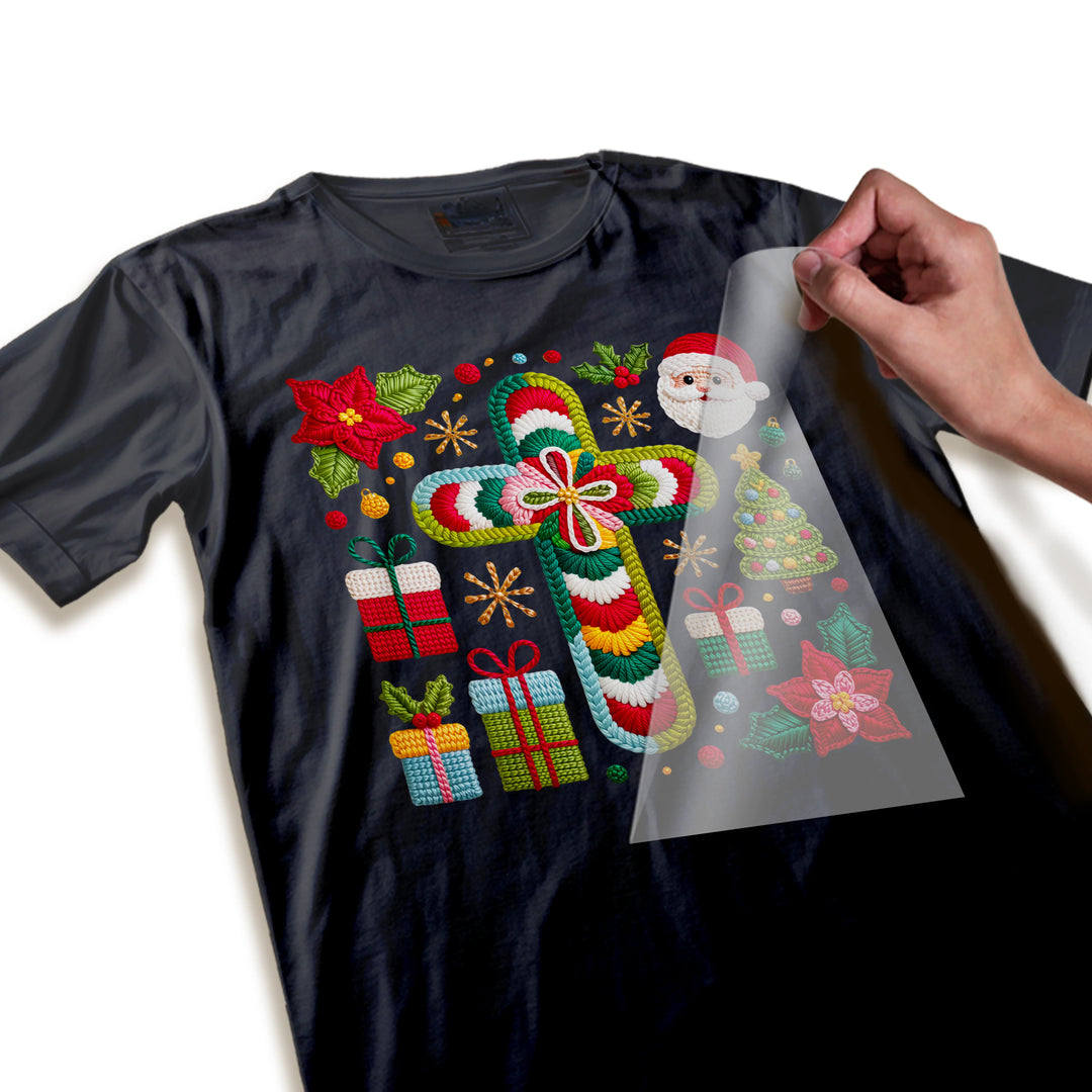 Close-up detail of Christmas cross DTF transfer showing intricate yarn texture, embroidered Santa face and dimensional holiday elements