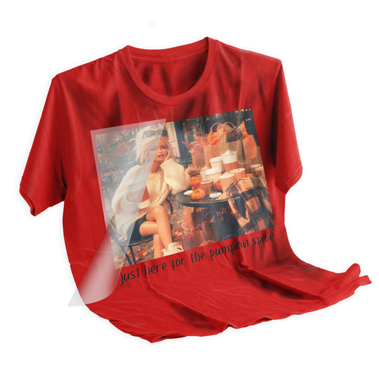 Heat press application of the Fall Retro Doll Pumpkin Spice DTF transfer being applied to a cream t-shirt using a heat press machine at 310 degrees Fahrenheit