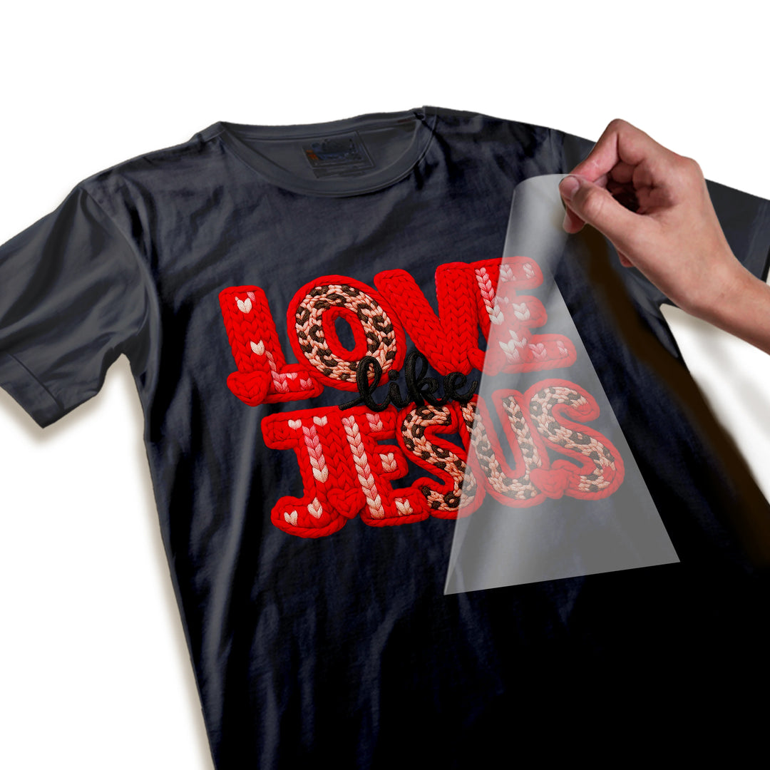 Close-up detail of Love Like Jesus DTF transfer showing knitted yarn texture and fiber weave effects in Valentine colors