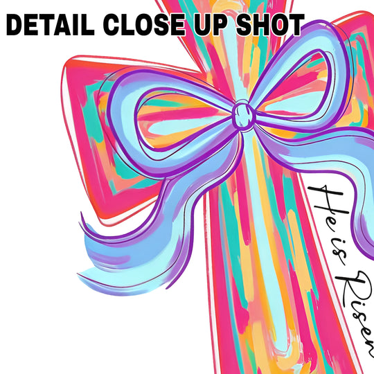 Colorful Easter cross DTF transfer design with purple bow and vibrant rainbow colors on white background
