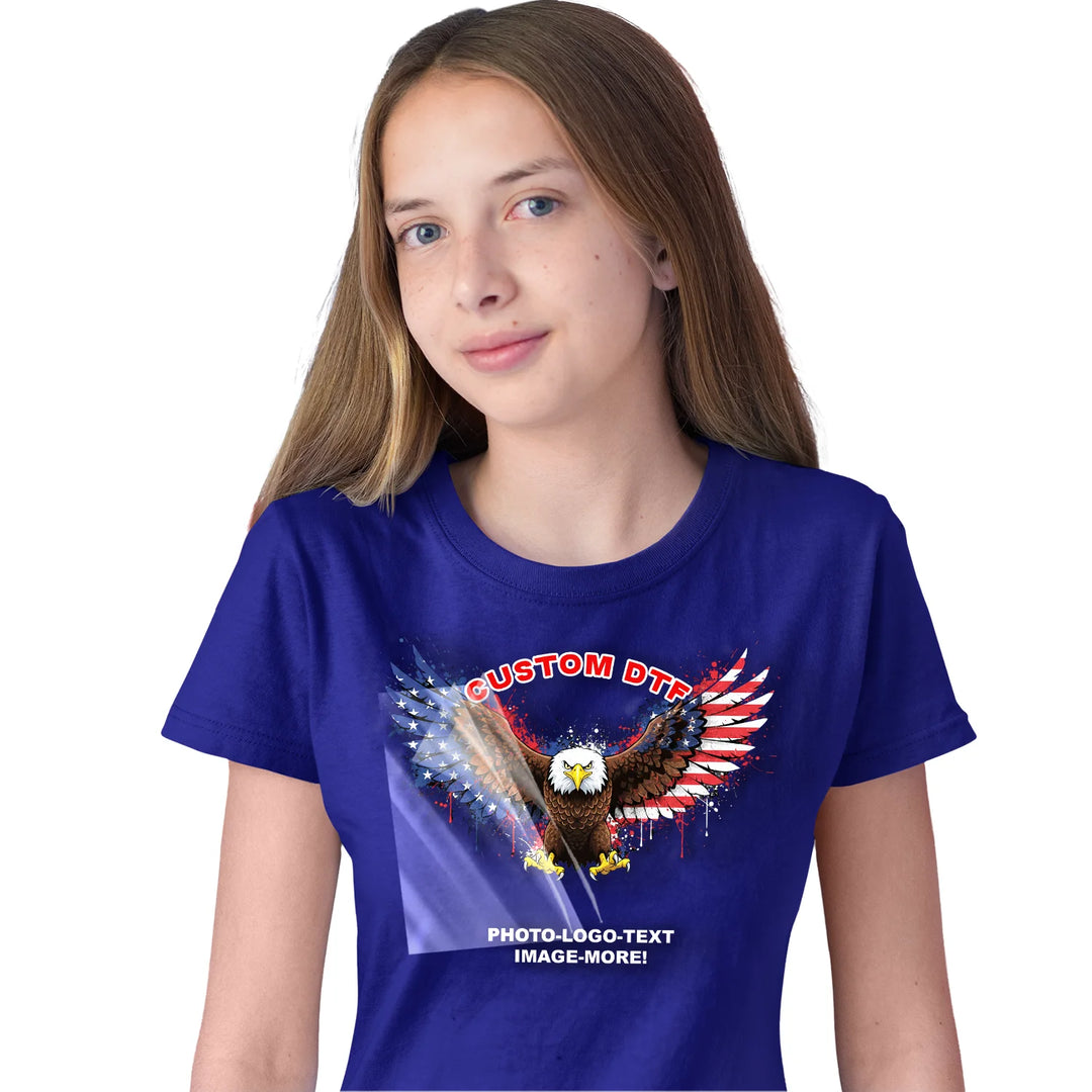 Custom DTF transfer applied to a youth kids t-shirt showing a USA patriotic design — full color ready-to-press transfer for kids shirts printed in USA by Mugsie, Agoura Hills CA