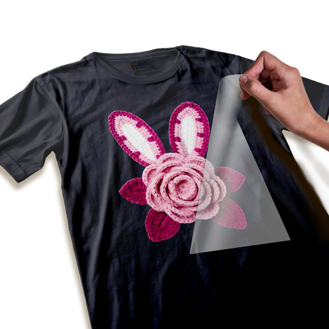 Close-up detail of knitted Easter bunny ears DTF transfer showing yarn-like texture, layered rose petals, and burgundy color depth