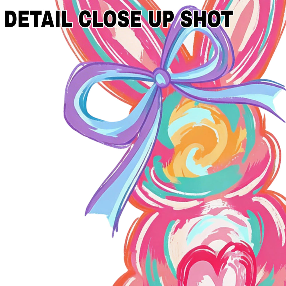 Colorful Easter bunny DTF transfer design with purple bow, pink and orange watercolor brush strokes, and heart accents on white background