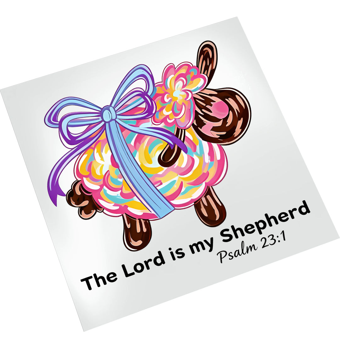 Easter lamb direct-to-film transfer featuring rainbow wool texture, purple ribbon bow, and biblical verse on white background mockup