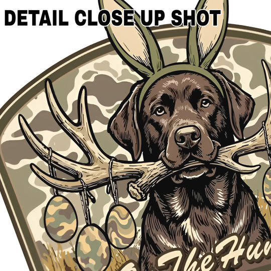 Easter DTF transfer design featuring chocolate Labrador dog wearing bunny ears surrounded by deer antlers on camouflage background with On The Hunt text