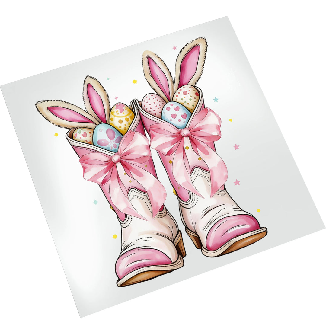 Pink cowboy boots Easter DTF transfer mockup on white t-shirt showing bunny ears and colorful egg decorations with soft watercolor styling