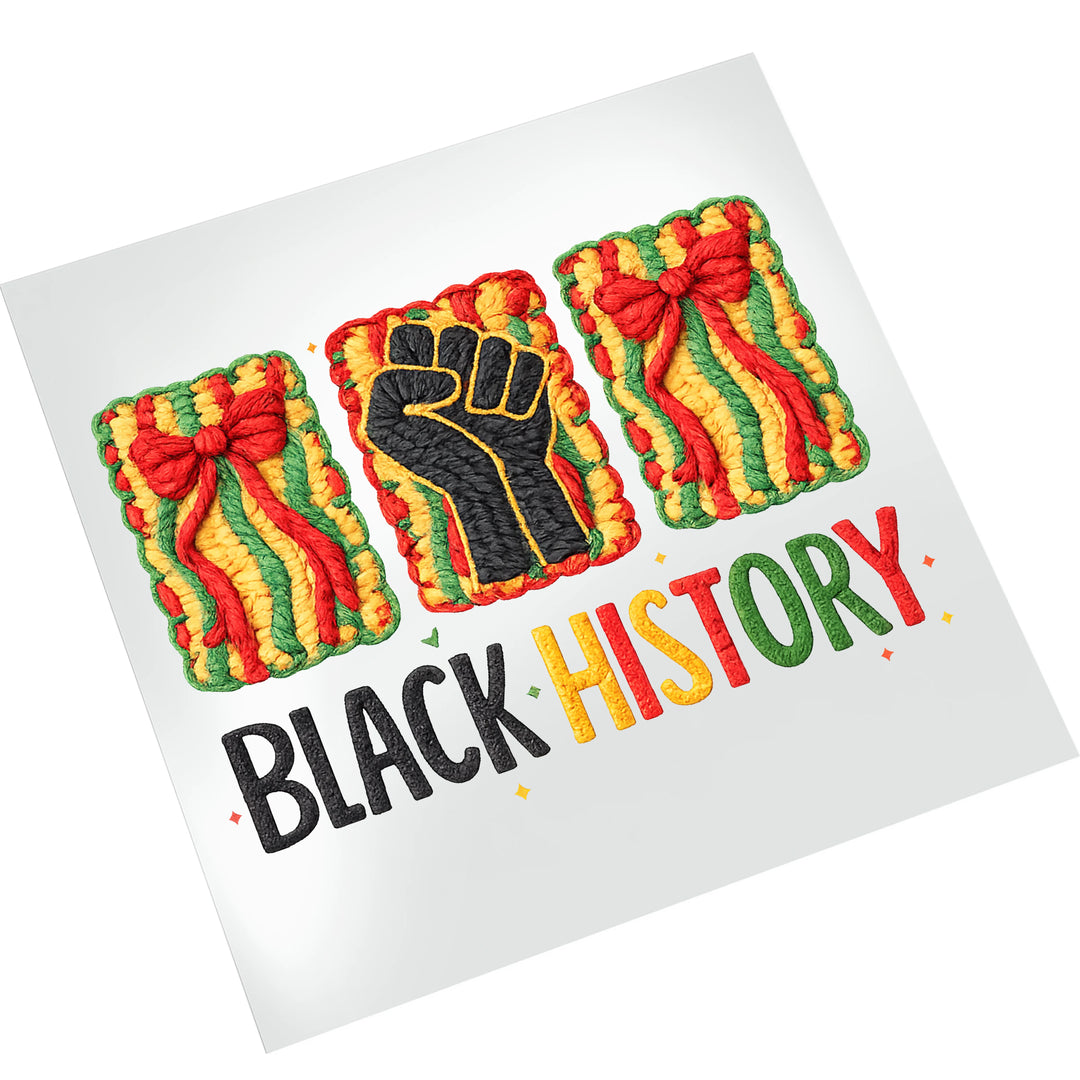 Black History unity fist DTF transfer on white background showing detailed yarn-like texture in Pan-African colors ready to press