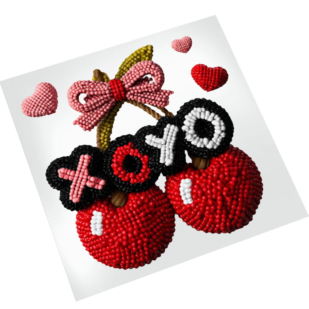 Cherry XOXO Valentine DTF transfer on white background showing dimensional textured hearts and fruit design ready for heat press application