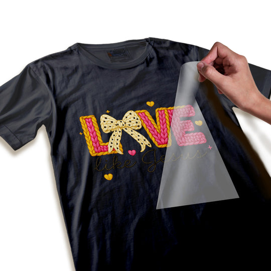 Close-up detail of Love Like Jesus DTF transfer showing realistic knitted yarn texture and color gradients