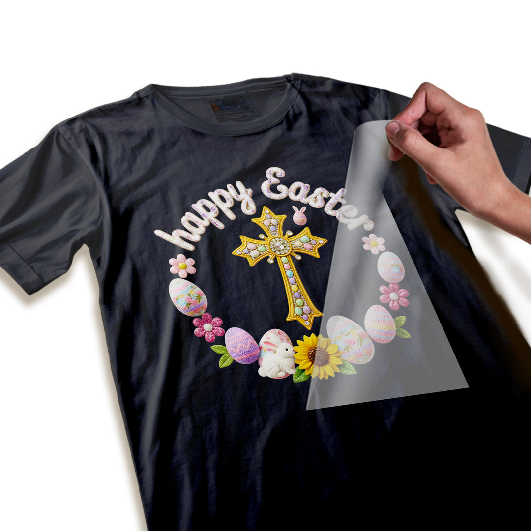 Close-up detail of Easter DTF transfer showing textured golden cross with sequin embellishments and dimensional Easter egg decorations with knitted appearance