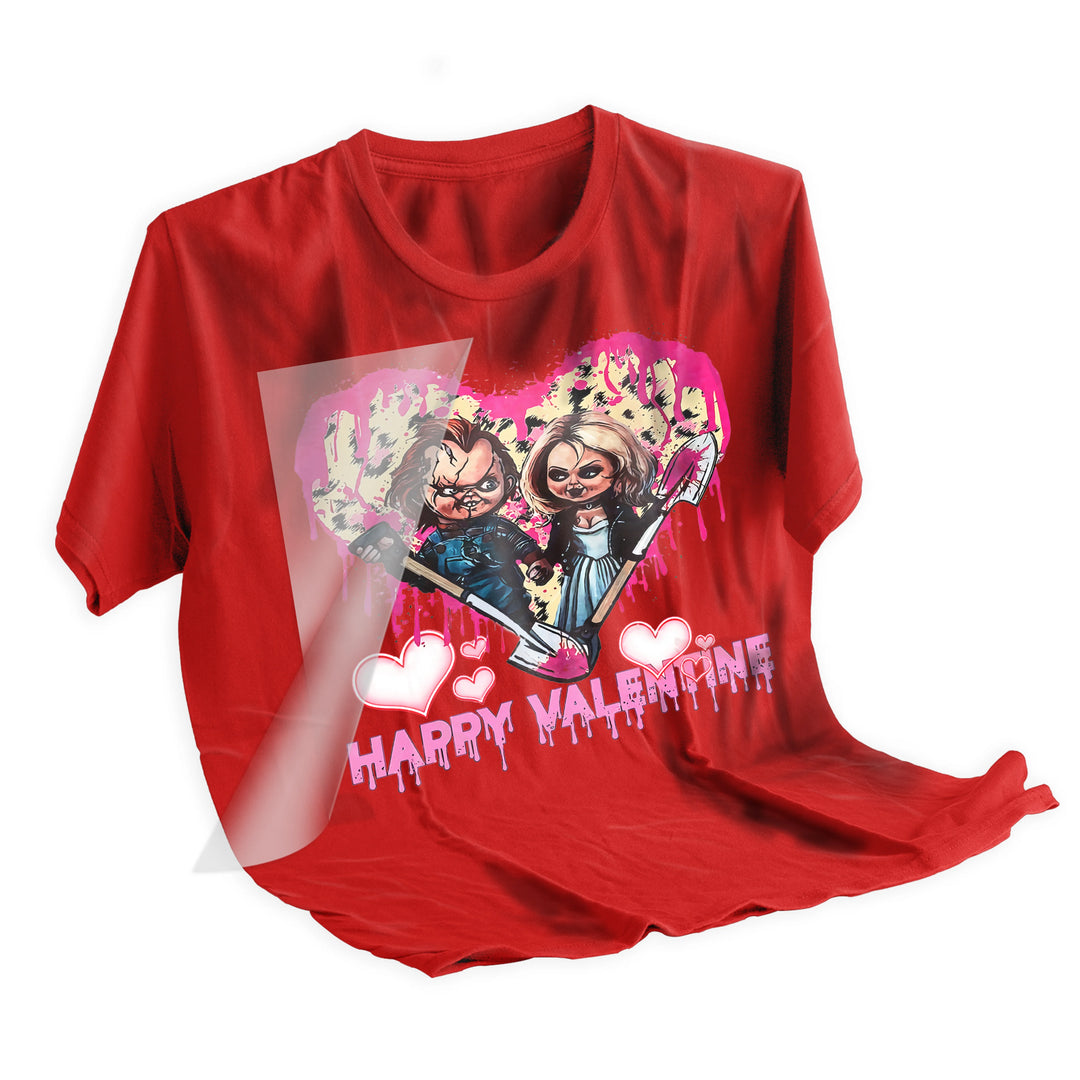 Valentine horror DTF transfer applied to black t-shirt showing Chucky and bride design with pink heart background and gothic Valentine theme