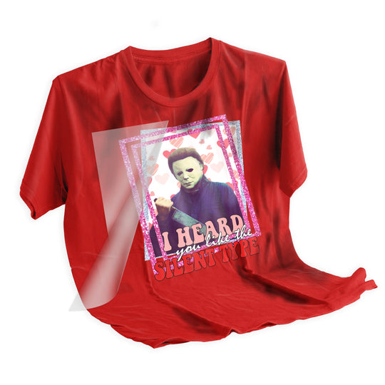Applied Valentine Michael Myers DTF transfer on dark shirt showing final pressed result with pink hearts and glitter border effects