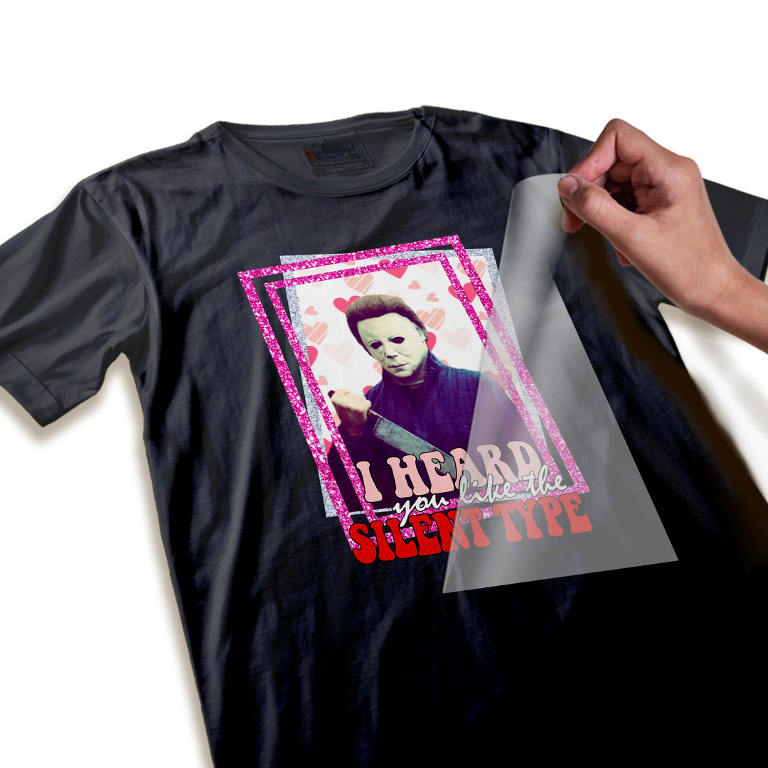 Close-up detail of Valentine DTF transfer showing glittery pink and silver border texture around Michael Myers and heart design elements