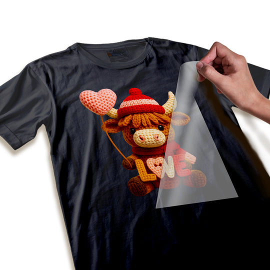 Close-up detail of Highland cow Valentine DTF transfer showing knitted texture quality and vibrant color saturation of yarn-style design