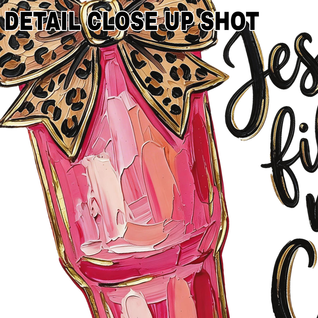 Jesus Fills My Cup DTF transfer design featuring pink watercolor tumbler with leopard print bow and black script lettering on white background