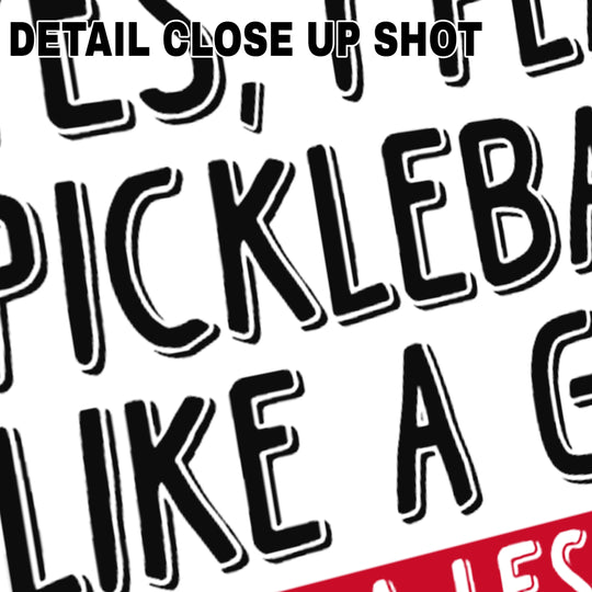 Pickleball DTF transfer design with bold black text saying 'YES, I PLAY PICKLEBALL LIKE A GIRL' with red banner 'NEED A LESSON?' on transparent background
