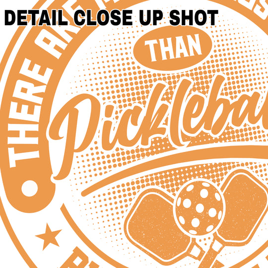 Orange vintage-style circular badge DTF transfer design with pickleball paddles and text saying There Are More Things To Life Than Pickleball But I Ignore Them